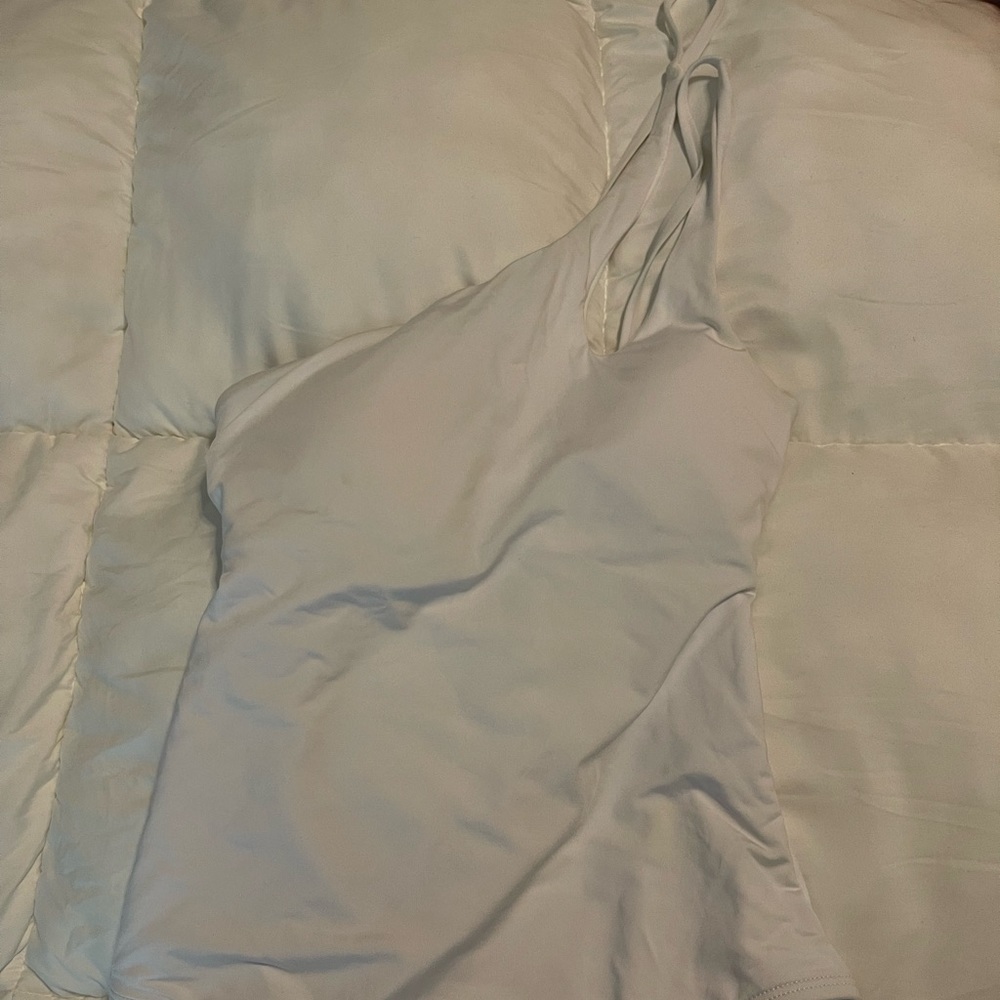 Becca White one shoulder swimsuit
